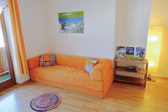 Couch in the kitchen/living room