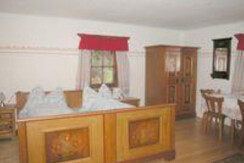 Haus Powoden Vierbettzimmer Bett