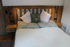 Confortable wooden double bed