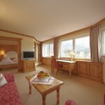 Photo of suite with shower, bathtub