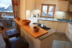 Small bar in front of the kitchen corner