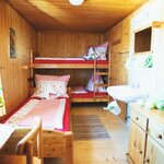 Photo of triple room with running hot/cold water