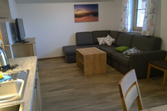 Wohnbereich mit ausziehbarem Sofa