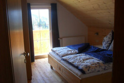 Schlafzimmer mit Ehebett