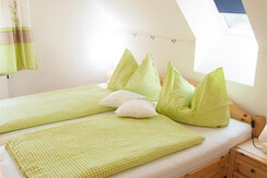 Weinbauernhof Bernhard Familienzimmer Bett