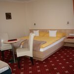 Photo of Triple room, shower, toilet, 2 bed rooms