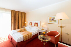 Doppelzimmer der Kategorie Stadtpark mit Balkon