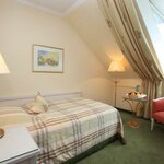 Photo of single room with bath tube | © Romantik Hotel im Park