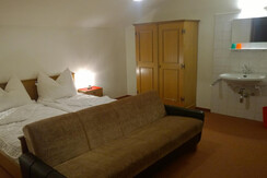 Doppelzimmer mit einem ausklapbaren Schlafsofa