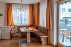 Dining table and access to the balcony