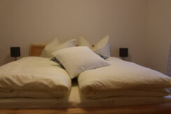Weingartenhaus Teltscher Zimmer gemütliches Bett