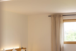 Weingut Kogler Appartement Kapellenblick Bett