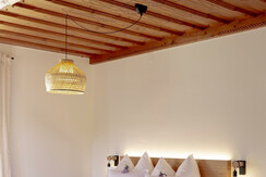 Weingut Kogler Appartement Obstgarten Bett