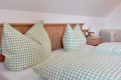 Bett im Ferienhaus
