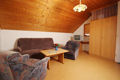 Wöhrerhof -  Ferienwohnung B (rosa) - Wohnraum